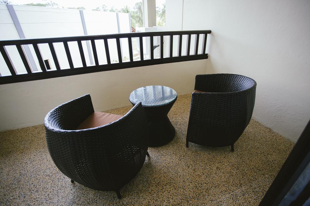 Sand & Sandals Desaru Beach Resort & Spa מראה חיצוני תמונה A set of outdoor furniture