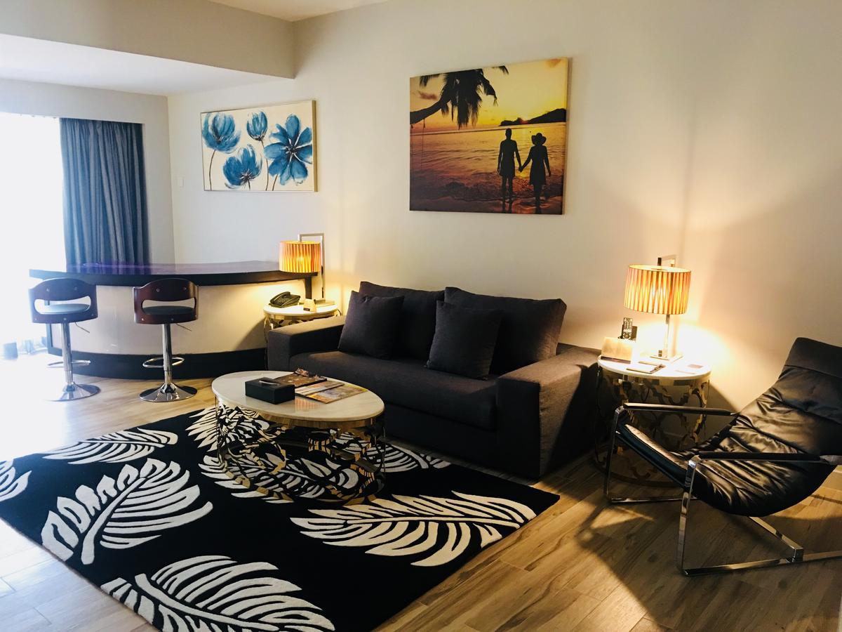 Sand & Sandals Desaru Beach Resort & Spa מראה חיצוני תמונה A living room in a hotel
